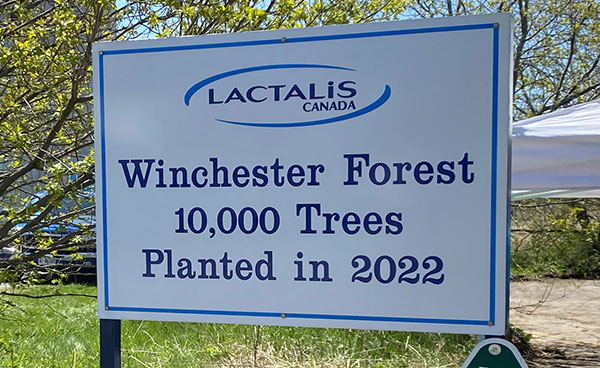 A Lactalis Canada sign stating: Winchester Forest 10,000 Trees Planted in 2022
