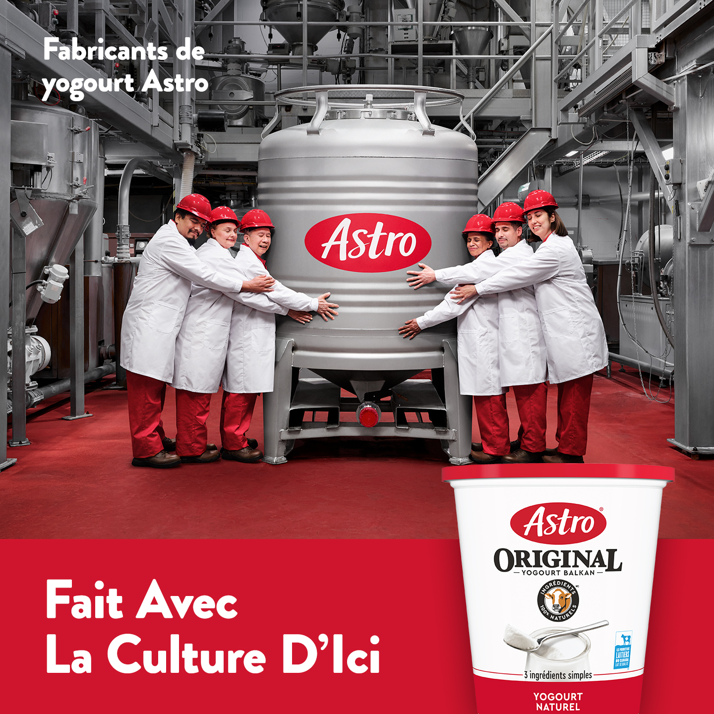 Employés entourant un réservoir de yogourt Astro